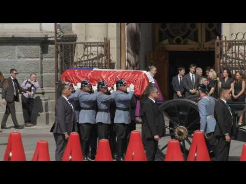 Coffin transporting body of Sebastian Pinera arrives at cathedral