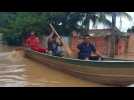 Residents move by boat in Bolivian flooded town after river overflows