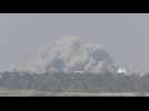 Large plume of smoke rises over central Gaza, seen from Israel