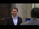 Former Austrian chancellor arrives at Vienna court
