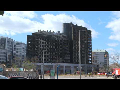 Smoke billows from Spanish apartment block after deadly fire