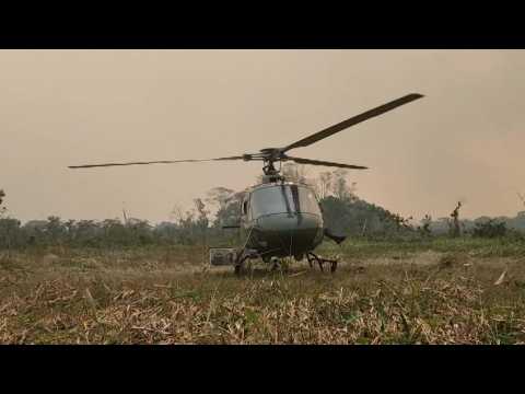 Firefighters combat blaze in Brazilian Amazon amid record fires