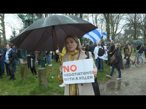 Anti-Putin protesters demonstrate near the Russian embassy in Paris