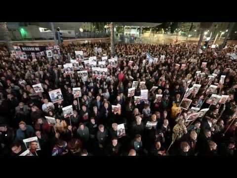 Supporters and families of hostages held in Gaza rally in Tel Aviv