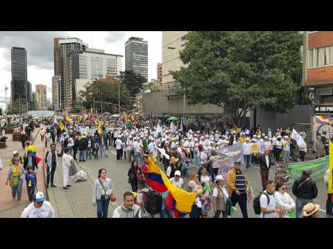 Thousands of Colombians march through the capital on International Workers' Day