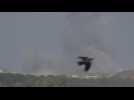 Smoke billows as air strike hits central Gaza, seen from Israel