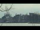 Images of collapsed Baltimore bridge as demolition crews work on it after ship collision