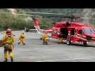 Taiwan: Emergency workers loading supplies onto helicopter for airdrop