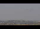 Aid airdropped over Gaza, seen from Israel