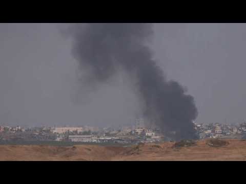 Smoke rises over central Gaza, seen from Israel