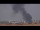 Smoke rises over central Gaza, seen from Israel