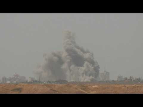 Large smoke cloud rises after strike on central Gaza, seen from Israel