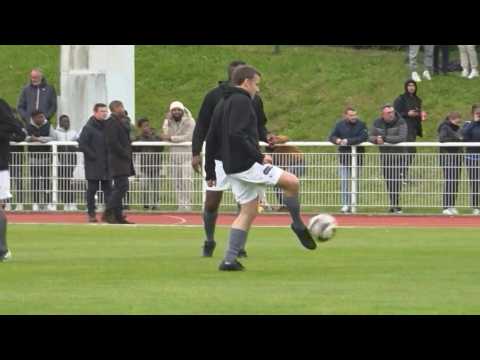 France's Macron takes part in charity football match