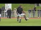 France's Macron takes part in charity football match