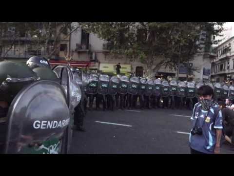 Police, protesters clash outside Argentine Congress as lawmakers continue debate on reforms
