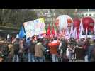 French civil servants demonstrate in streets of Paris over pay