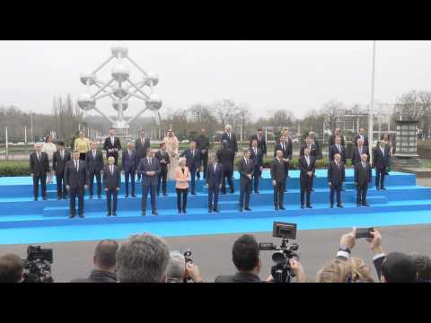 Leaders pose for group photo on first day of Nuclear Energy Summit in Brussels
