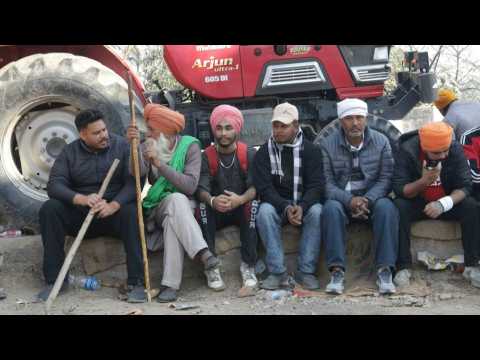 Indian police block highway to stop protesting farmers en route to New Delhi
