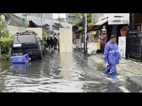 Heavy rain, flooding as Indonesia goes to the polls