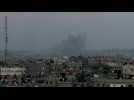 Smoke rises over Khan Yunis seen from Rafah