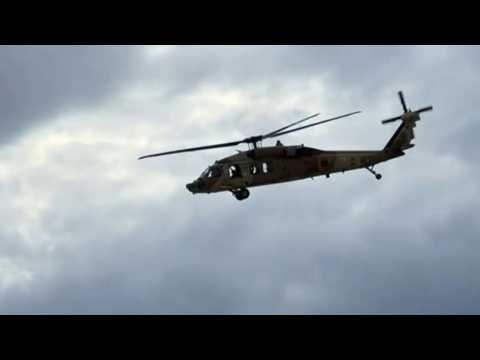 An Israeli military helicopter flies over Rafah
