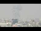 Plumes of smoke rise over northern Gaza, seen from Israel