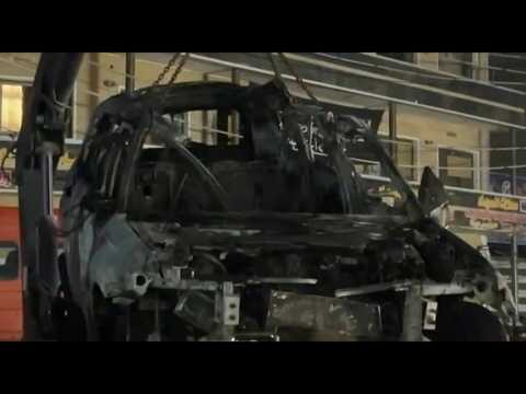 Charred vehicle targeted in drone strike on Iraqi capital