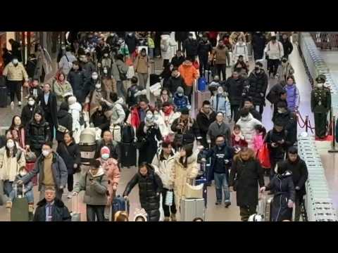 Crowds throng Beijing railway station for Lunar New Year rush