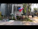 People lay flowers outside home of ex-Chile president Pinera after death in helicopter crash