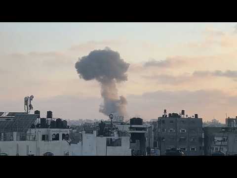 Large plumes of smoke rise over Gaza City