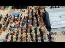 Palestinians perform Friday noon prayers near tent in Rafah
