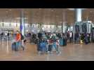 Travellers at Tel Aviv airport after reopening following Iranian attack