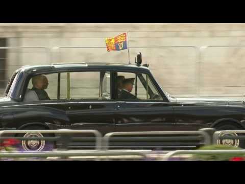 King Charles III arrives at Buckingham Palace