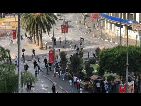 Palestinian protesters clash with Palestinian security forces in Nablus