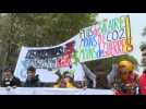 Protesters march in Paris for wages and pensions