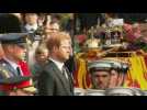 Royal Family walk down The Mall behind Queen's coffin