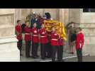 Queen Elizabeth II's coffin leaves Westminster Abbey after funeral