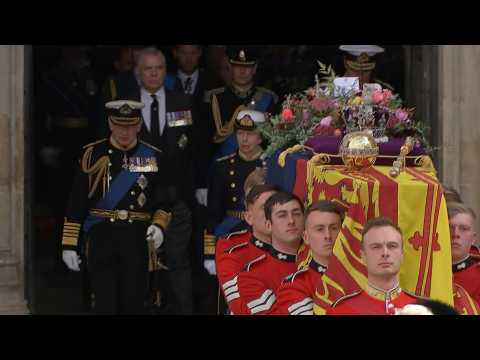 Queen Elizabeth II's coffin leaves Westminster Abbey with royals standing by