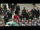 Members of the Royal Family walk behind Queen Elizabeth II's coffin