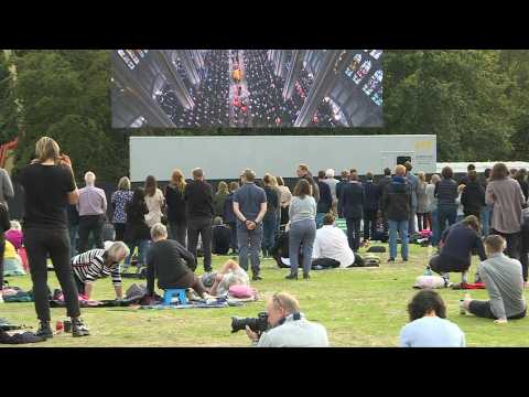 People in London's Hyde Park stand for beginning of Queen's committal service in Windsor