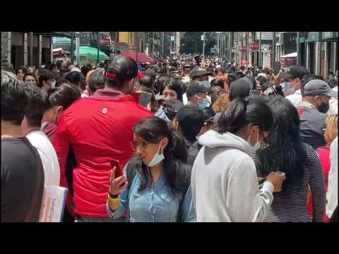 People gather on street after quake in Mexico City