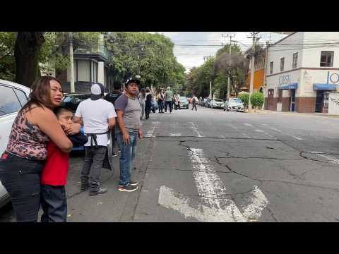 Mexico City residents gather in street after quake on anniversary of deadly tremors