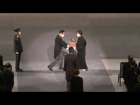 Shinzo Abe's widow Akie carries ashes as state funeral begins