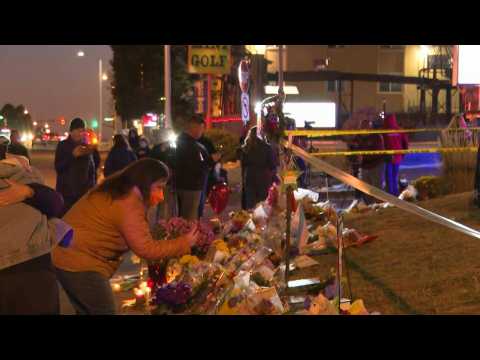 People pay respects at memorial for Colorado Springs shooting victims