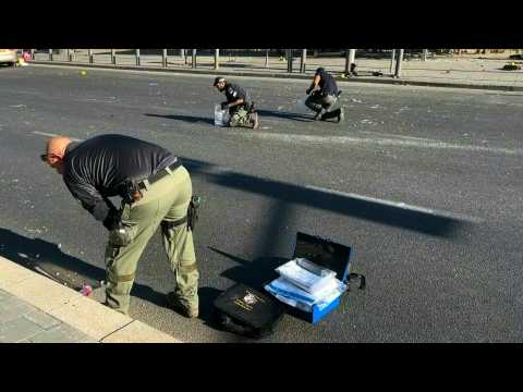 Israel police gather evidence at Jerusalem bus station targeted by bomb