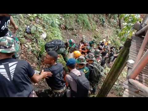 Images of destruction and search for victims after deadly Indonesia earthquake