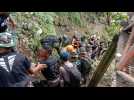 Images of destruction and search for victims after deadly Indonesia earthquake