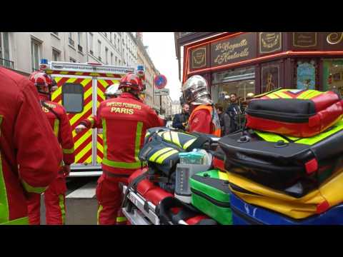 Police and firefighters at scene after Paris shooting