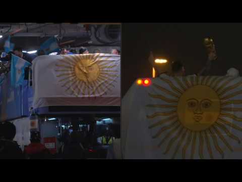 Argentina team bus leaves stadium with Messi lifting World Cup trophy