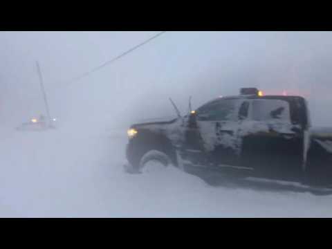 Snow covers roads as blizzard slams New York